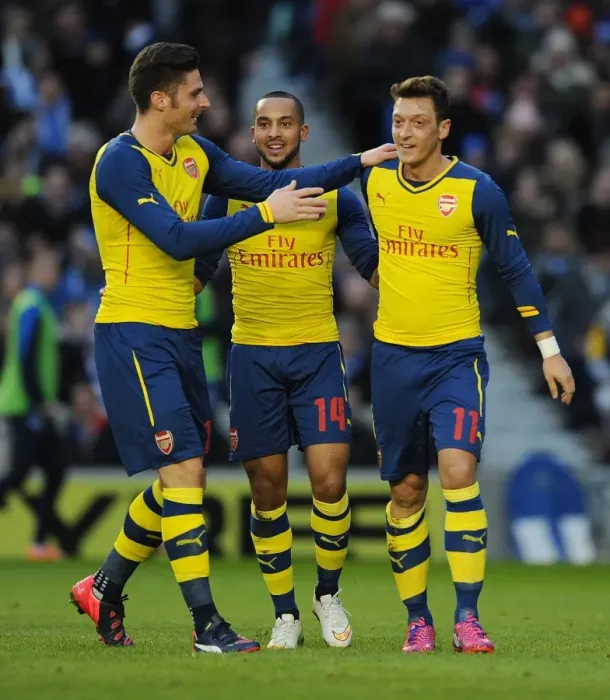 Framed Print : Mesut Ozil, Olivier Giroud, and Theo Walcott Celebrate Arsenal's Goals Against Brighton & Hove Albion in FA Cup Fourth Round