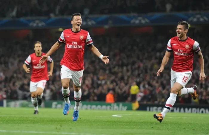 Framed Print : Mesut Ozil and Olivier Giroud Celebrate Arsenal's First Goal Against Napoli in the 2013-14 UEFA Champions League Framed Print : Mesut Ozil and Olivier Giroud Celebrate Arsenal's First Goal Against Napoli in the 2013-14 UEFA Champions League