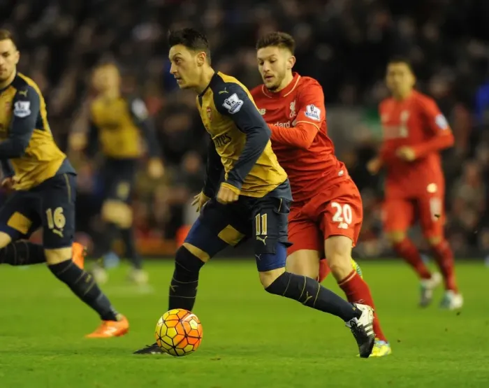 Framed Print : Mesut Ozil Outmaneuvers Adam Lallana: Premier League Showdown between Liverpool and Arsenal (2015-16) Framed Print : Mesut Ozil Outmaneuvers Adam Lallana: Premier League Showdown between Liverpool and Arsenal (2015-16)