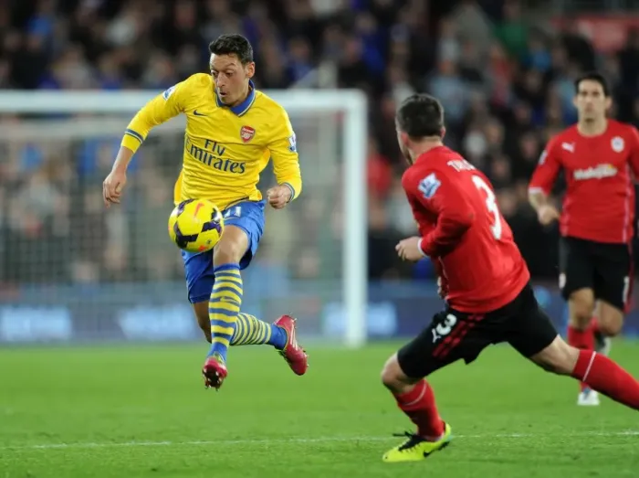 Framed Print : Mesut Ozil Outmaneuvers Andrew Taylor: Cardiff City vs. Arsenal, Premier League 2013-14