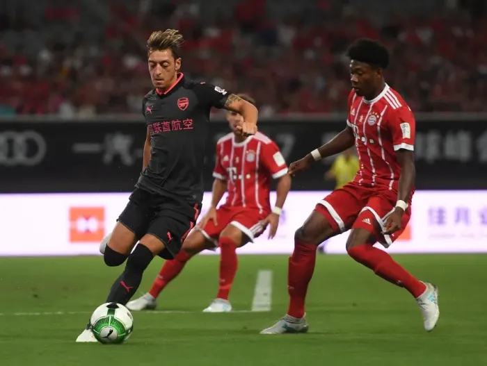 Framed Print : Mesut Ozil Outmaneuvers David Alaba: Bayern Munich vs. Arsenal Pre-Season Clash