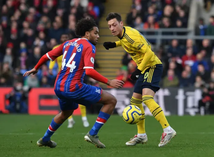 Framed Print : Mesut Ozil Outmaneuvers Jairo Riedewald: Crystal Palace vs. Arsenal, Premier League 2019-20