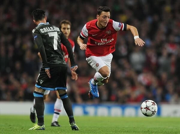 Mesut Ozil Outmaneuvers Jose Callejon in Arsenal's UEFA Champions League Clash