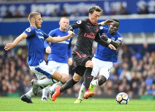 Mesut Ozil Outmaneuvers Nikola Vlasic and Idrissa Gana Gueye in Everton vs Arsenal Clash