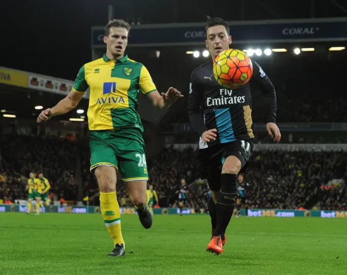 Framed Print : Mesut Ozil Outmaneuvers Ryan Bennett: Premier League Showdown between Norwich and Arsenal (2015-16)