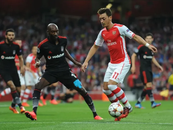 Framed Print : Mesut Ozil Outsmarts Atiba Hutchinson: Arsenal's UEFA Champions League Victory Framed Print : Mesut Ozil Outsmarts Atiba Hutchinson: Arsenal's UEFA Champions League Victory