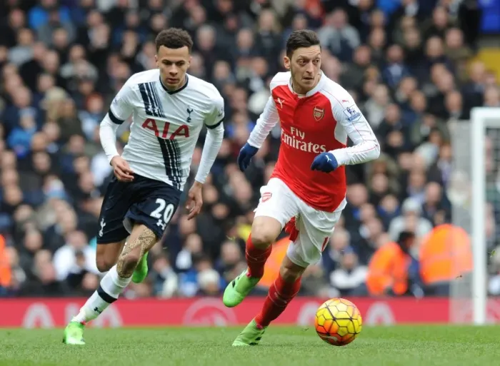 Framed Print : Mesut Ozil Outsmarts Dele Alli: Premier League Showdown between Tottenham and Arsenal, 2015-16