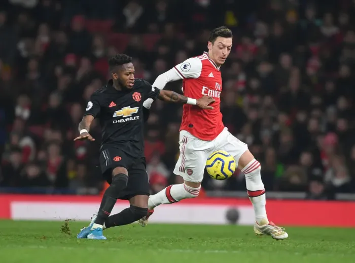 Framed Print : Mesut Ozil Outsmarts Fred: Arsenal's Masterclass vs Manchester United Framed Print : Mesut Ozil Outsmarts Fred: Arsenal's Masterclass vs Manchester United