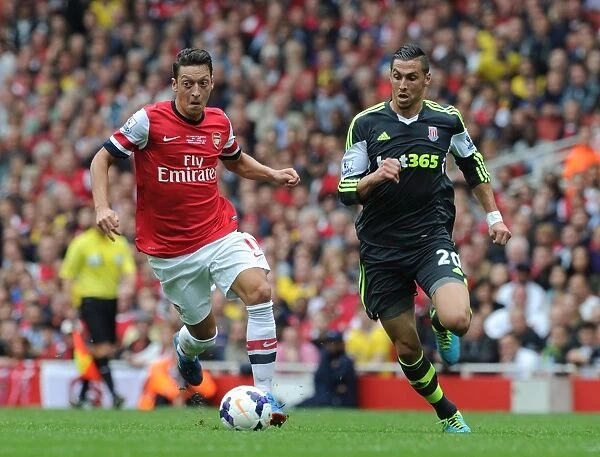 Mesut Ozil Outsmarts Geoff Cameron: Arsenal's Masterclass in the 2013-14 Premier League