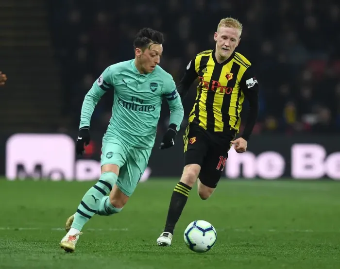 Framed Print : Mesut Ozil Outsmarts Will Hughes: A Premier League Battle at Vicarage Road (April 2019) Framed Print : Mesut Ozil Outsmarts Will Hughes: A Premier League Battle at Vicarage Road (April 2019)