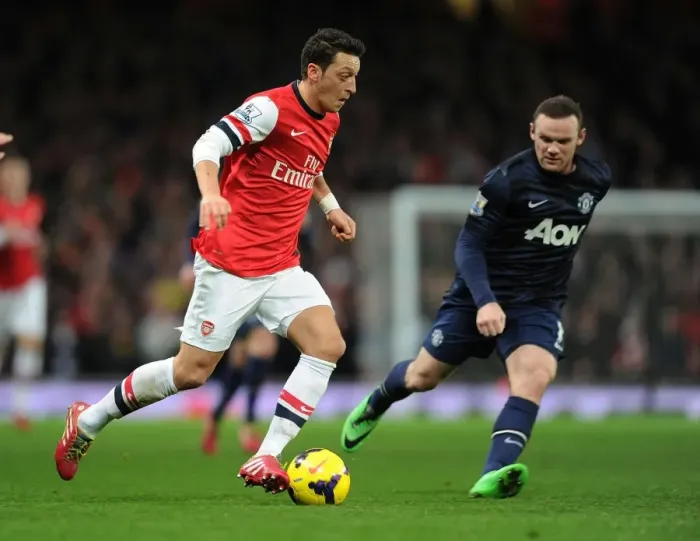 Framed Print : Mesut Ozil Outsmarts Wayne Rooney: Arsenal's Masterclass vs Manchester United, Premier League 2013-14 Framed Print : Mesut Ozil Outsmarts Wayne Rooney: Arsenal's Masterclass vs Manchester United, Premier League 2013-14