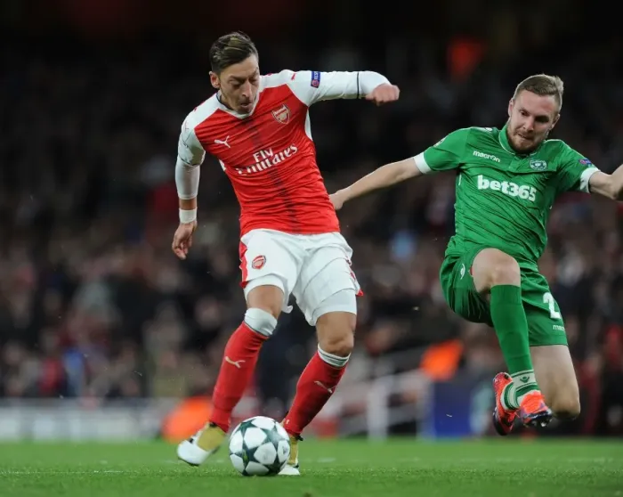 Framed Print : Mesut Ozil Scores Arsenal's Fourth Goal in Champions League Match Against Ludogorets (2016-17)