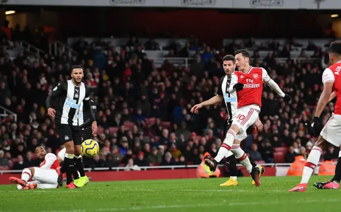 Framed Print : Mesut Ozil Scores Arsenal's Third Goal vs. Newcastle United (Premier League 2019-20)
