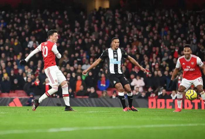 Framed Print : Mesut Ozil Scores the Decisive Goal: Arsenal's Triumph over Newcastle United, Premier League 2019-20 Framed Print : Mesut Ozil Scores the Decisive Goal: Arsenal's Triumph over Newcastle United, Premier League 2019-20