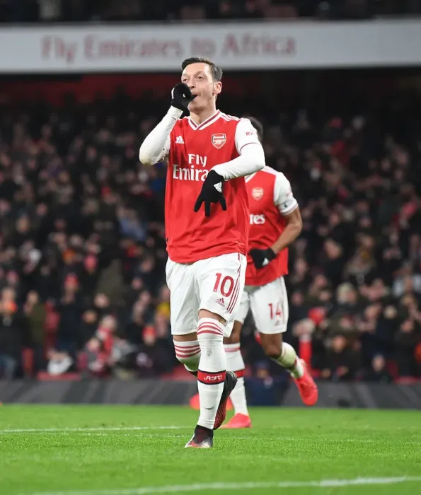 Framed Print : Mesut Ozil Scores Third Goal: Arsenal FC Triumphs Over Newcastle United in Premier League