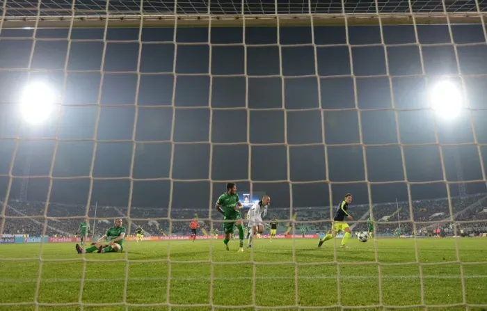 Framed Print : Mesut Ozil Scores Third Goal Against Ludogorets: Arsenal's Victory in UEFA Champions League