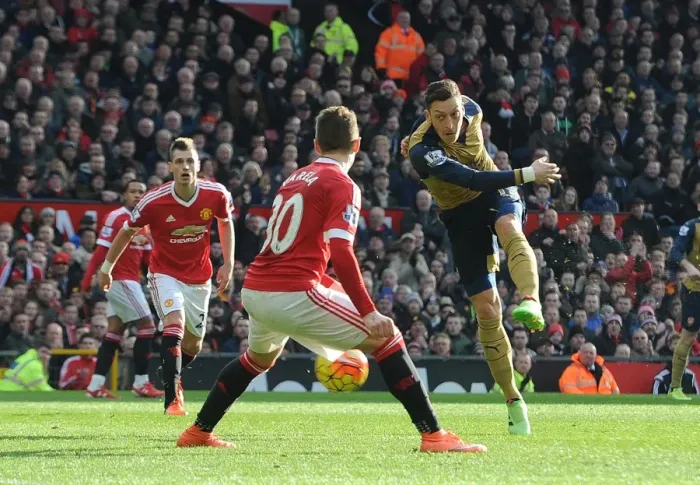 Framed Print : Mesut Ozil Scores the Winning Goal Against Guillermo Varela: Arsenal's Triumph over Manchester United in the Premier League 2015 / 16 Framed Print : Mesut Ozil Scores the Winning Goal Against Guillermo Varela: Arsenal's Triumph over Manchester United in the Premier League 2015 / 16