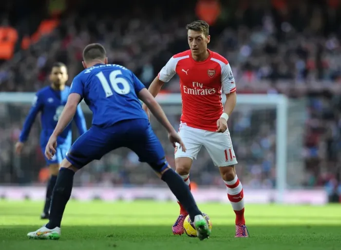Framed Print : Mesut Ozil Takes on James McCarthy: Arsenal vs. Everton, Premier League 2014-15 Framed Print : Mesut Ozil Takes on James McCarthy: Arsenal vs. Everton, Premier League 2014-15