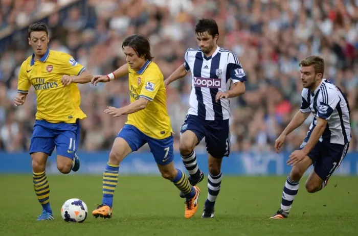 Framed Print : Mesut Ozil and Tomas Rosicky vs Claudio Yacob and James Morrison: Arsenal's Midfield Battle against West Bromwich Albion (2013-14) Framed Print : Mesut Ozil and Tomas Rosicky vs Claudio Yacob and James Morrison: Arsenal's Midfield Battle against West Bromwich Albion (2013-14)