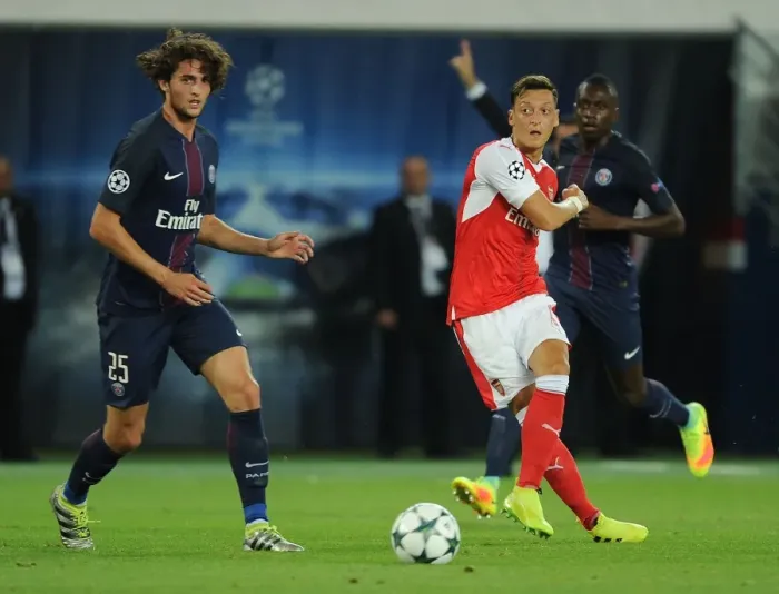Framed Print : Mesut Ozil vs. Adrien Rabiot: A Champions League Battle at Parc des Princes Framed Print : Mesut Ozil vs. Adrien Rabiot: A Champions League Battle at Parc des Princes