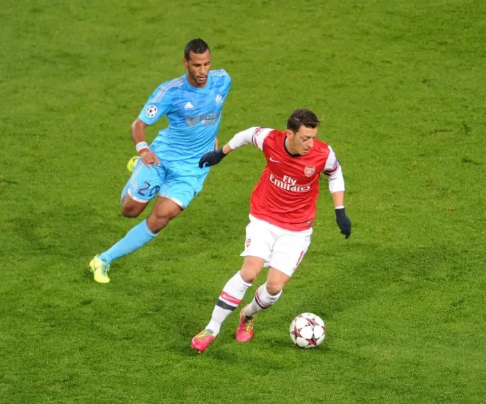 Framed Print : Mesut Ozil vs. Alaixys Romao: A Football Rivalry in the Arsenal vs. Marseille UEFA Champions League Clash Framed Print : Mesut Ozil vs. Alaixys Romao: A Football Rivalry in the Arsenal vs. Marseille UEFA Champions League Clash