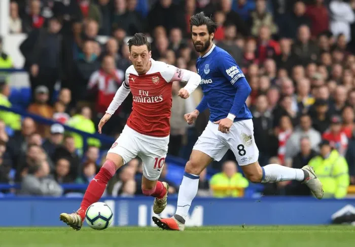 Framed Print : Mesut Ozil vs. Andre Gomes: A Midfield Duel at Goodison Park - Arsenal vs. Everton, Premier League 2018-19