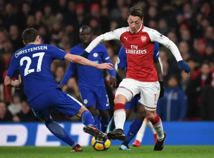 Framed Print : Mesut Ozil vs. Andreas Christensen: Clash of the Midfield Maestros (Arsenal v Chelsea, Premier League) Framed Print : Mesut Ozil vs. Andreas Christensen: Clash of the Midfield Maestros (Arsenal v Chelsea, Premier League)