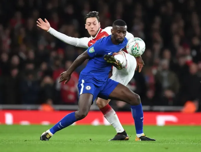 Framed Print : Mesut Ozil vs. Antonio Rudiger: Clash in the Carabao Cup Semi-Final
