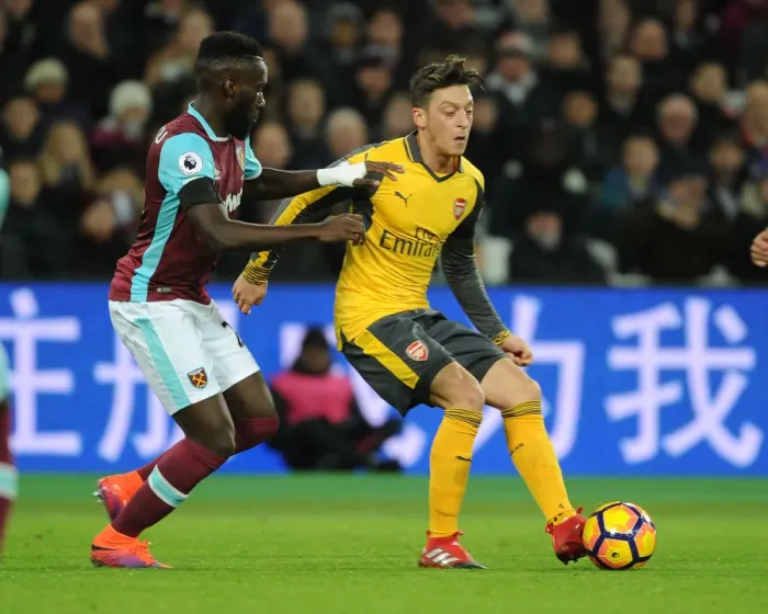 Framed Print : Mesut Ozil vs. Arthur Masuaku: A Premier League Battle - Arsenal vs. West Ham United (December 2016)