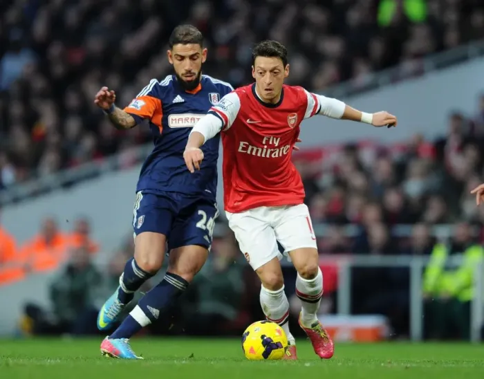 Framed Print : Mesut Ozil vs. Ashkan Dejagah: Arsenal vs. Fulham, Premier League Clash (2013-14)