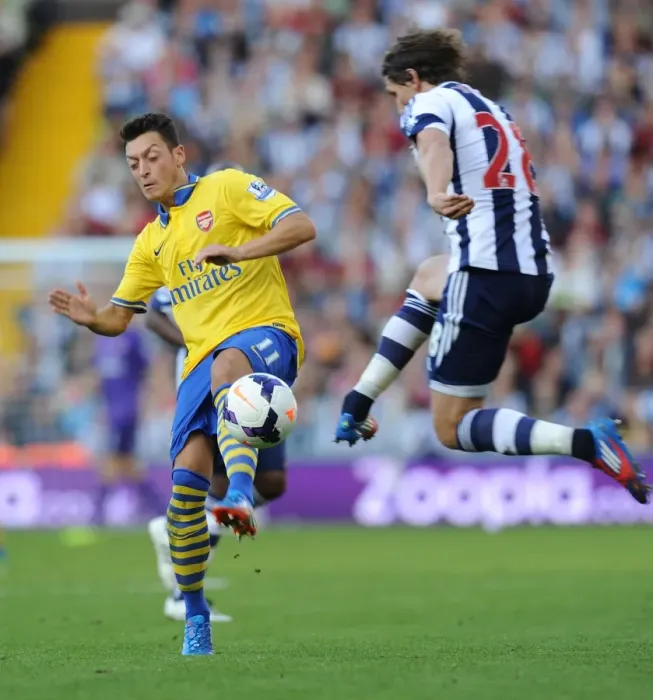 Framed Print : Mesut Ozil vs Billy Jones: Clash at The Hawthorns - Arsenal vs West Bromwich Albion, 2013-14 Premier League Framed Print : Mesut Ozil vs Billy Jones: Clash at The Hawthorns - Arsenal vs West Bromwich Albion, 2013-14 Premier League