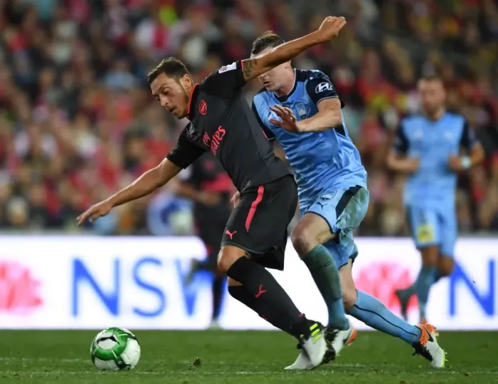 Framed Print : Mesut Ozil vs Brandon O'Neill: Sydney FC vs Arsenal Pre-Season Clash Framed Print : Mesut Ozil vs Brandon O'Neill: Sydney FC vs Arsenal Pre-Season Clash
