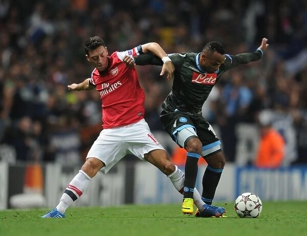 Mesut Ozil vs. Camilo Zuniga: Clash at the Emirates - Arsenal v Napoli, UEFA Champions League, 2013