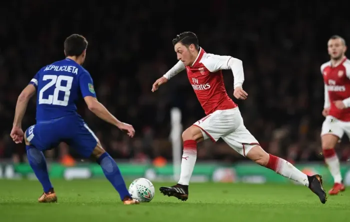 Framed Print : Mesut Ozil vs Cesar Azpilicueta: A Skillful Showdown in the Arsenal-Chelsea Carabao Cup Semi-Final