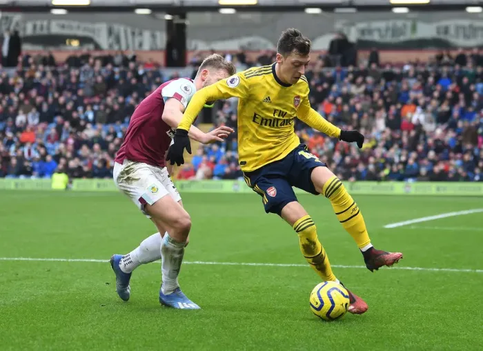 Framed Print : Mesut Ozil vs Charlie Taylor: Burnley vs Arsenal, Premier League 2019-2020