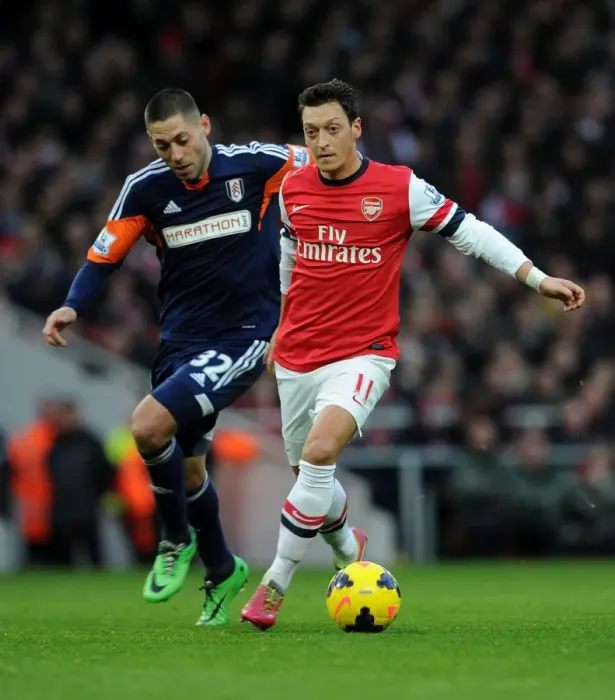 Framed Print : Mesut Ozil vs. Clint Dempsey: A Battle at the Emirates - Arsenal v Fulham, Premier League 2013-14 Framed Print : Mesut Ozil vs. Clint Dempsey: A Battle at the Emirates - Arsenal v Fulham, Premier League 2013-14