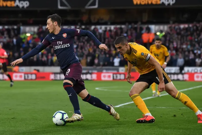 Framed Print : Mesut Ozil vs. Conor Coady: Battle at Molineux - Wolverhampton Wanderers vs. Arsenal FC, Premier League 2018-19