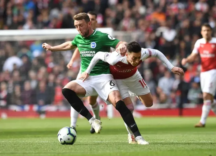 Framed Print : Mesut Ozil vs Dale Stephens: Intense Battle at Arsenal's Emirates Stadium (Arsenal v Brighton & Hove Albion 2018-19) Framed Print : Mesut Ozil vs Dale Stephens: Intense Battle at Arsenal's Emirates Stadium (Arsenal v Brighton & Hove Albion 2018-19)