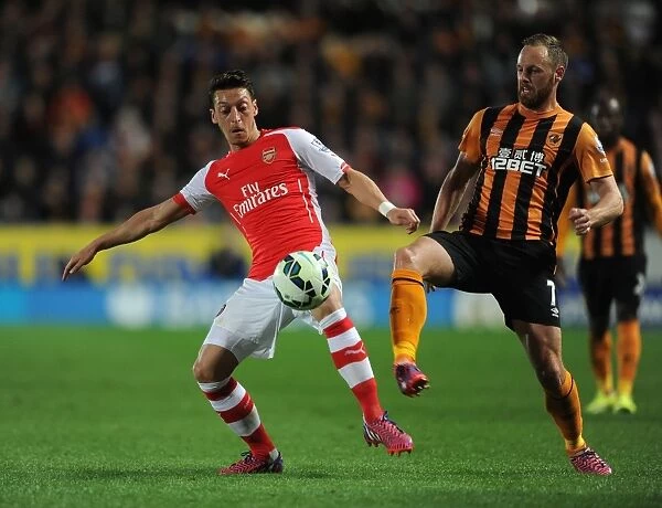 Mesut Ozil vs. David Meyler: Intense Battle in Hull City vs. Arsenal, Premier League 2014 / 15