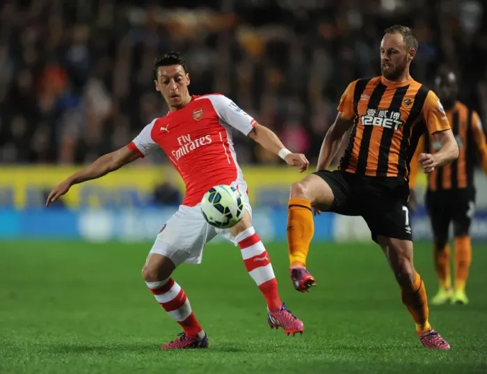 Framed Print : Mesut Ozil vs. David Meyler: Intense Battle in Hull City vs. Arsenal, Premier League 2014 / 15