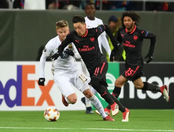 Framed Print : Mesut Ozil vs. Dennis Widgren: Clash in the Europa League between Ostersunds and Arsenal Framed Print : Mesut Ozil vs. Dennis Widgren: Clash in the Europa League between Ostersunds and Arsenal