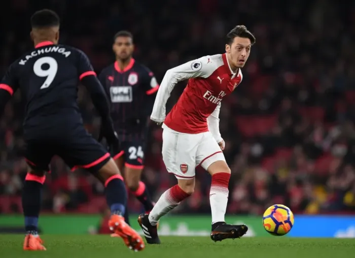 Framed Print : Mesut Ozil vs Elias Kachunga: Battle at the Emirates - Arsenal v Huddersfield Town, Premier League 2017-18 Framed Print : Mesut Ozil vs Elias Kachunga: Battle at the Emirates - Arsenal v Huddersfield Town, Premier League 2017-18