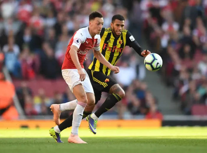 Framed Print : Mesut Ozil vs. Etienne Capoue: A Battle in the Arsenal v Watford Premier League Clash Framed Print : Mesut Ozil vs. Etienne Capoue: A Battle in the Arsenal v Watford Premier League Clash
