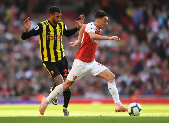 Framed Print : Mesut Ozil vs. Etienne Capoue: Clash at the Emirates - Arsenal v Watford, Premier League 2018-19