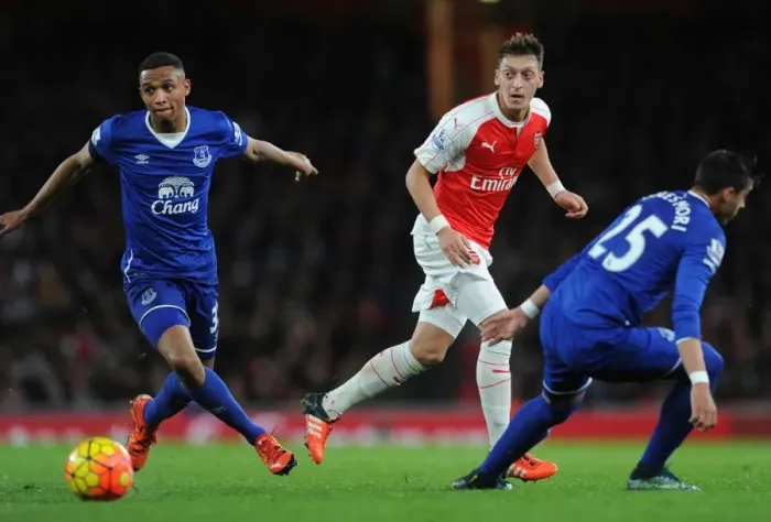 Framed Print : Mesut Ozil vs Everton's Defense: A Battle of Wits in the Arsenal vs Everton Premier League Clash, 2015 / 16 Framed Print : Mesut Ozil vs Everton's Defense: A Battle of Wits in the Arsenal vs Everton Premier League Clash, 2015 / 16