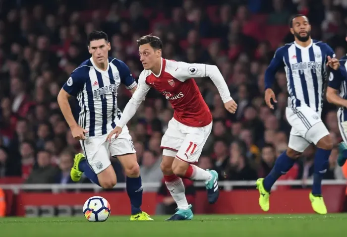 Framed Print : Mesut Ozil vs. Gareth Barry: Clash at the Emirates - Arsenal v West Bromwich Albion, 2017-18 Premier League