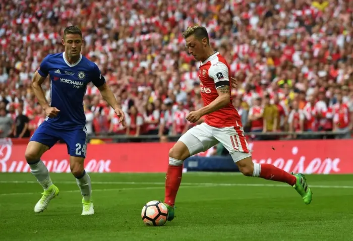Framed Print : Mesut Ozil vs. Gary Cahill: A Battle at the FA Cup Final Framed Print : Mesut Ozil vs. Gary Cahill: A Battle at the FA Cup Final