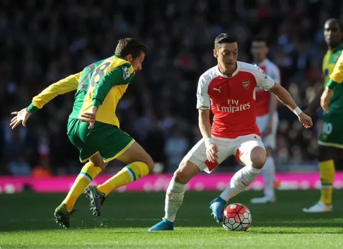 Framed Print : Mesut Ozil vs. Gary O'Neil: A Battle at the Arsenal - Arsenal vs. Norwich City, Premier League, 2016