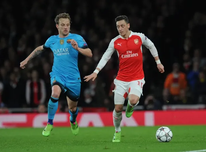 Framed Print : Mesut Ozil vs. Ivan Rakitic: Arsenal vs. Barcelona Clash in UEFA Champions League Framed Print : Mesut Ozil vs. Ivan Rakitic: Arsenal vs. Barcelona Clash in UEFA Champions League