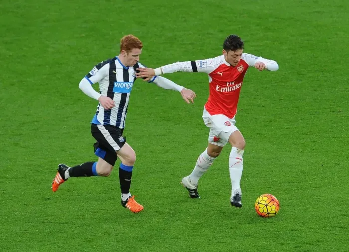 Framed Print : Mesut Ozil vs Jack Colback: A Fierce On-Pitch Battle at Arsenal's Emirates Stadium (Arsenal v Newcastle United, 2015-16) Framed Print : Mesut Ozil vs Jack Colback: A Fierce On-Pitch Battle at Arsenal's Emirates Stadium (Arsenal v Newcastle United, 2015-16)